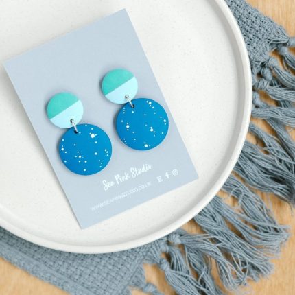 Kynance blue with white spots painted wooden bead drop earrings with green stud fittings by Sea Pink Studio