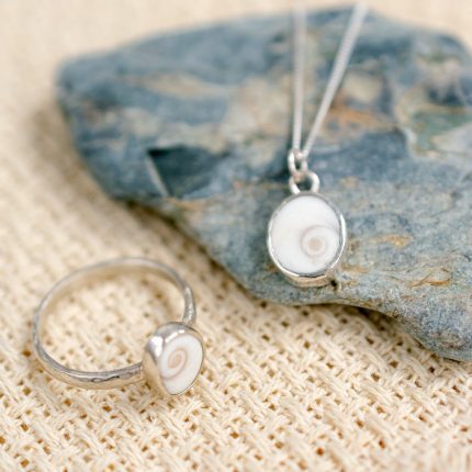 Matching sterling silver pendant and ring with Shiva shell setting by Porth Jewellery