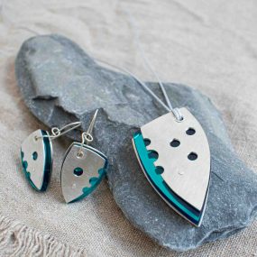 Pair Of Teal Perspex And Pewter Contemporary Drop Earrings And Matching Pendant On Waxed Grey Cord By Ceciel Van Oevelen