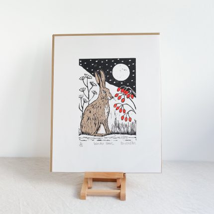 Woodcut print of a hare in the winter moonlight by Louisa Ellis