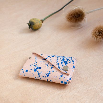 Natural leather wallet with handpainted blue splat pattern by Wild Origin