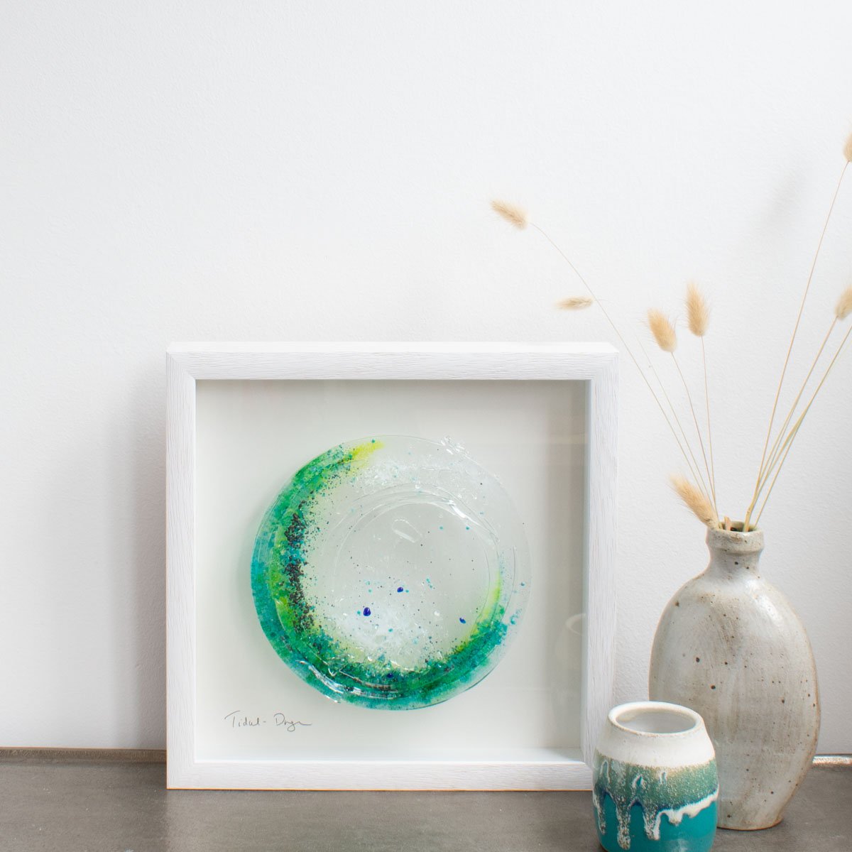 Fused glass green wave artwork in white box frame by Dreya Glass