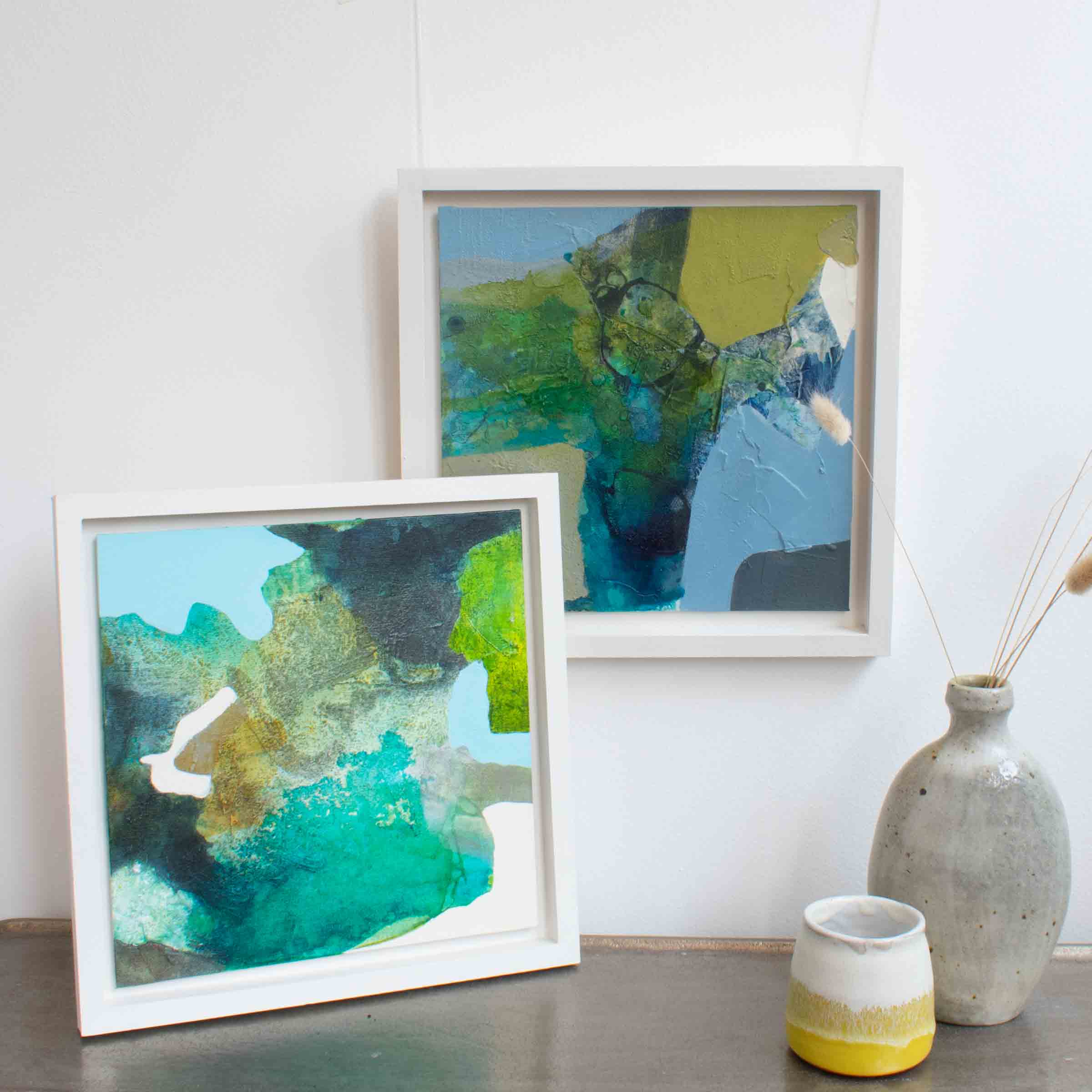 Pair of framed paintings of water in rockpools by Sharon Bruster