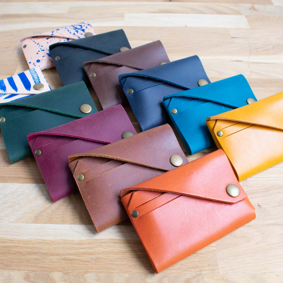 Group of handcrafted leather wallets in various colours by Wild Origin