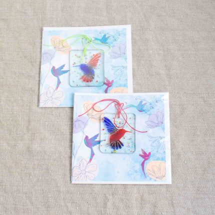 Group of two fused glass hummingbird decorations in different colours with card by Dreya Glass