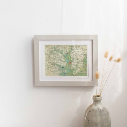 Cornish Paper Cut Art Falmouth map mounted in a grey frame.