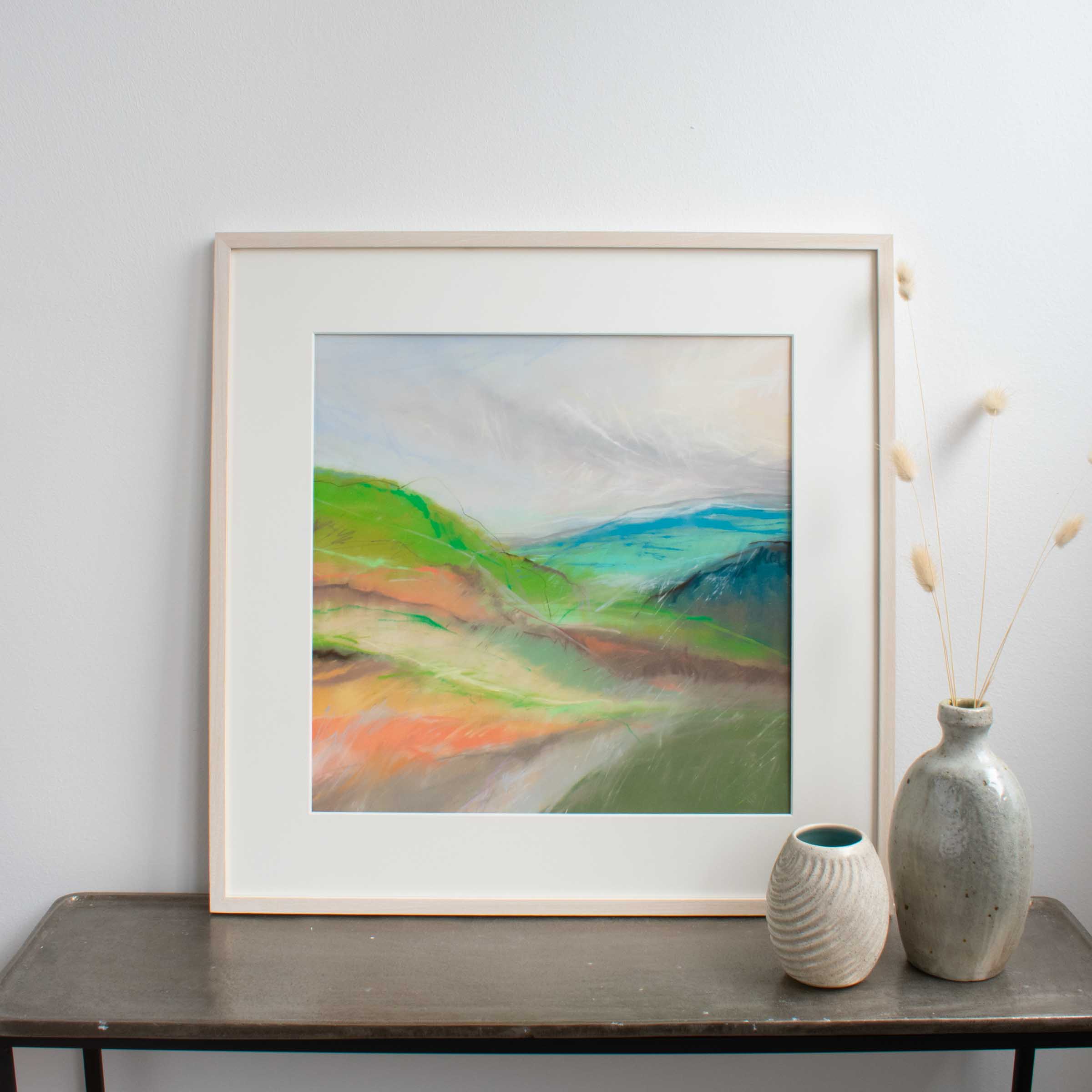 Framed pastel artwork of the coast by Erica Ankers