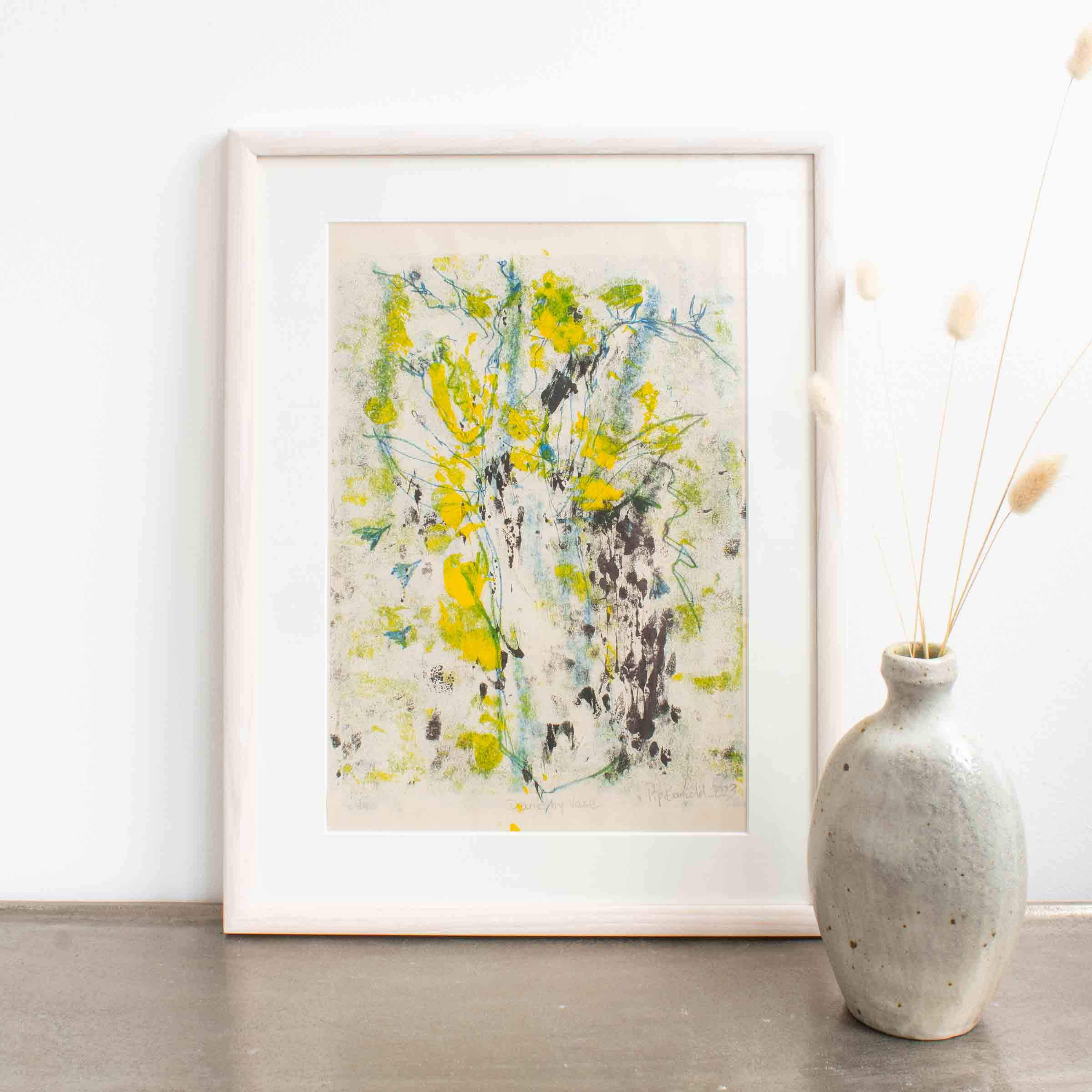 Framed monoprint of a yellow flowers by Pip Barfield