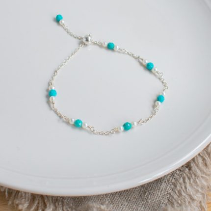 Turquoise, pearl bead and silver chain adjustable bracelet by Sarah de Larrinaga