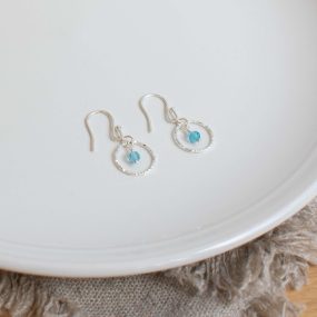 Pair Of Blue Topaz And Silver Wire Circle Drop Earrings By Sarah De Larrinaga