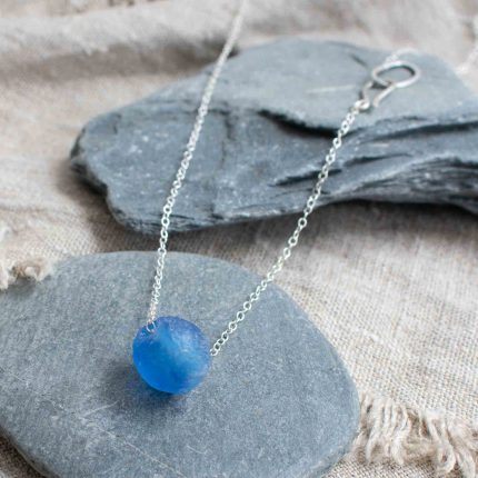 Blue bottle bead on a silver chain by Sarah Drew