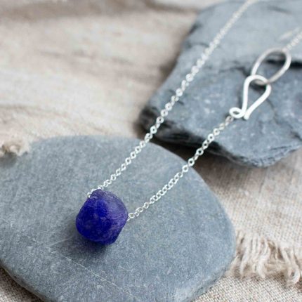 Navy blue bottle bead on a silver chain by Sarah Drew