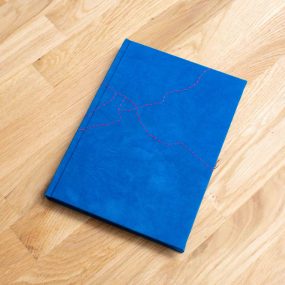 A6 Handcrafted Book With Indigo Fabric Cover And Red Stitched Map Of Mullion Village, Cornwall By Books N Boxes