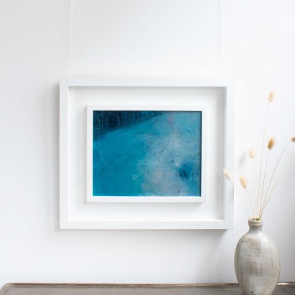 Original oil and cold wax abstract artwork in shades of blue in a white wood frame by Helen Leaver