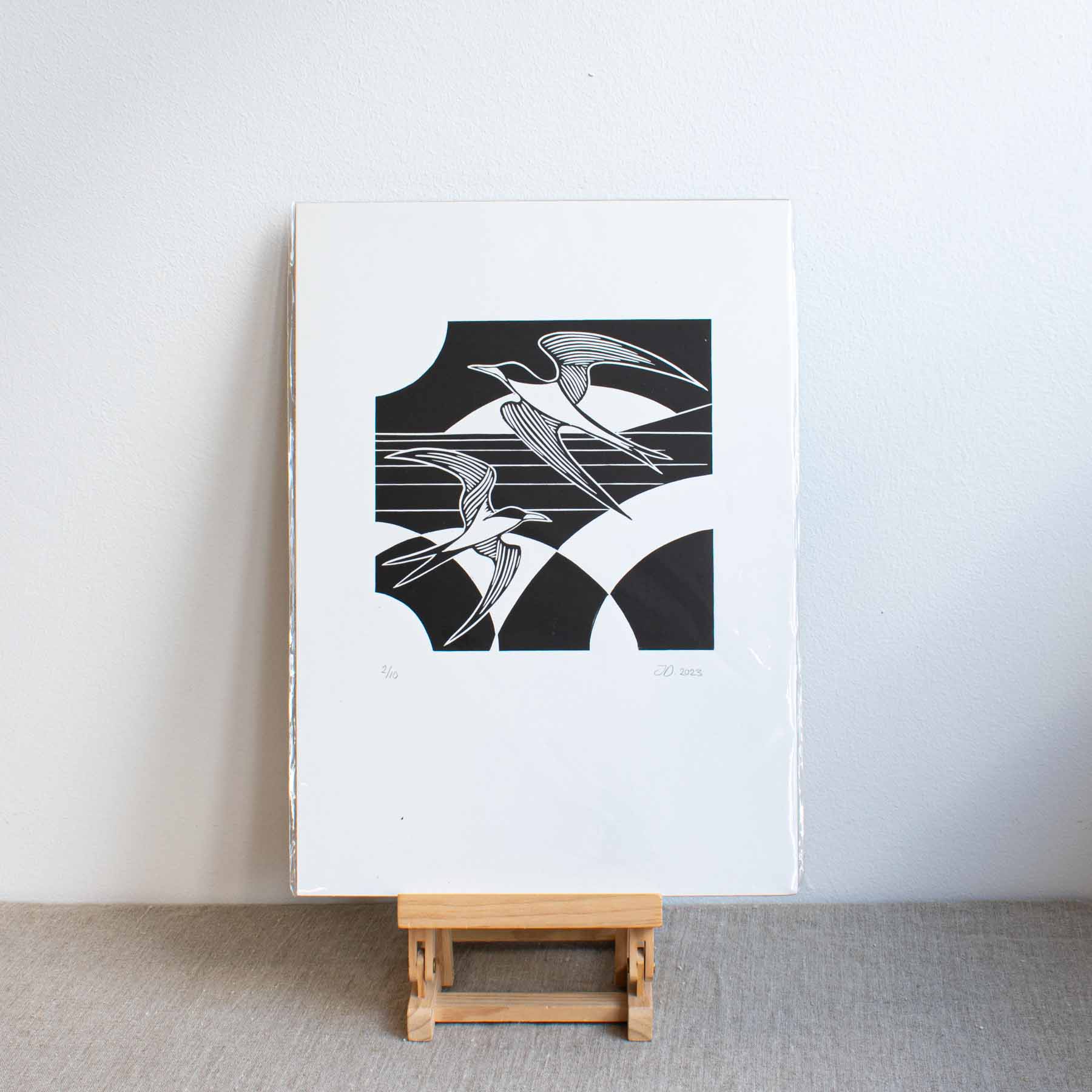 Black and white lino print of terns by Riverbird Studio