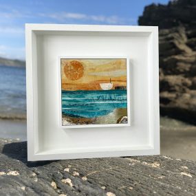 Collage Of A Boat And Sun In A White Frame On A Beach By Jane Wilson