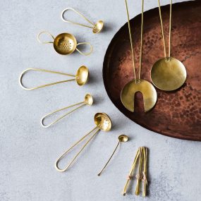 Display Of Brass Spoons With Copper Platter By Razmaker