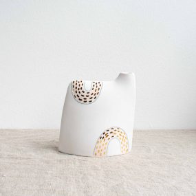 Porcelain Vase With Pale Pink Design And Gold Dots On A Linen Tablecloth By Frances Spice