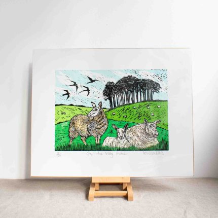 Woodcut print of three sheep in fields in front of the Coming Home trees by Louisa Ellis