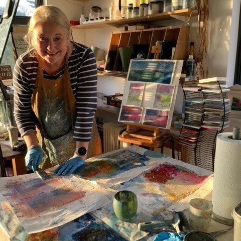 Blonde woman in her artist studio