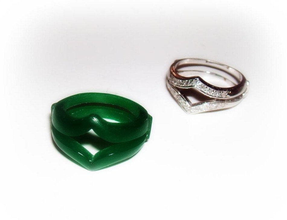 Green wax carved ring master and finished silver cast ring with diamonds