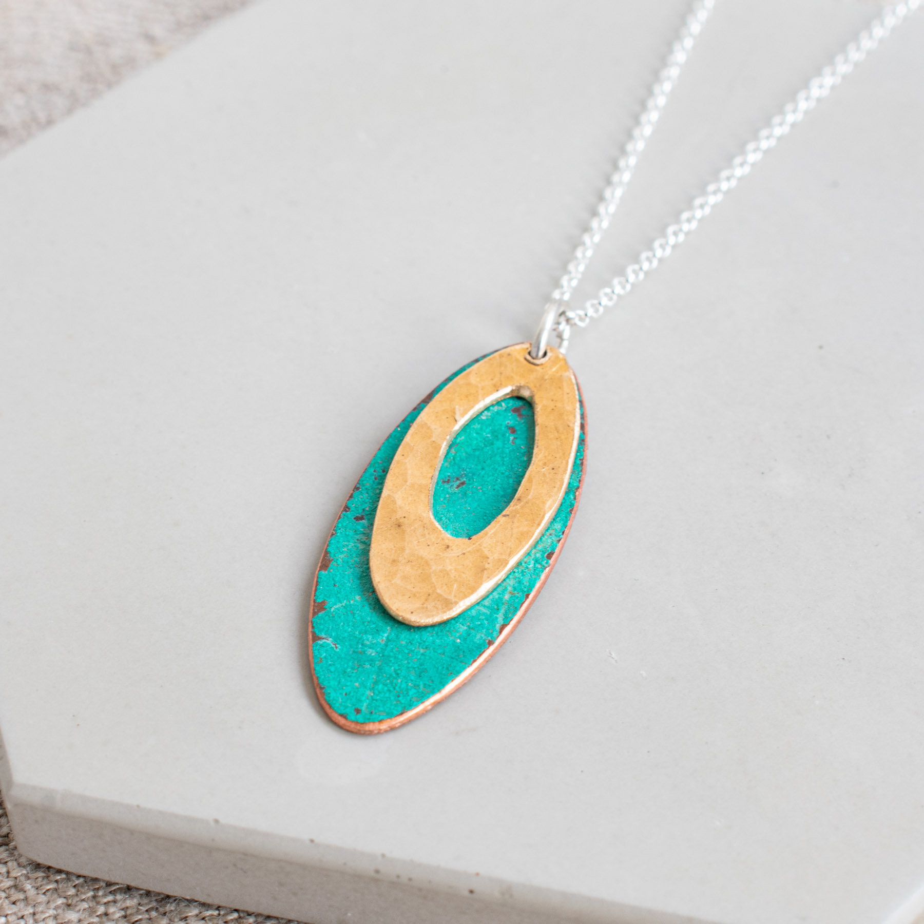 Oval Copper Pendant with Gilding Metal
