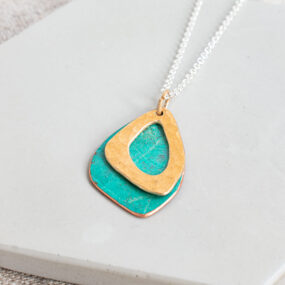 Rounded Triangle Copper Pendant With Gilding Metal